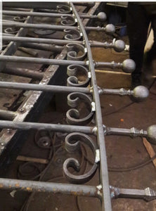 BRAND NEW bi folding curved top Iron Gate with c scrolls bushes and railheads