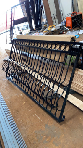 Bow bar metal balcony with circles